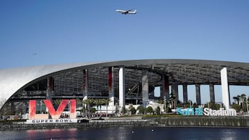 An Air China jetliner plane flies over SoFi Stadium, the host venue for Super Bowl LVI, ahead of the NFC Championship game between the Los Angeles Rams and the San Francisco 49ers in Inglewood, California, U.S., January 30, 2022. REUTERS/Bing Guan